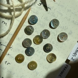 Knapper af perlemor Ø11,4 mm - 12 stk